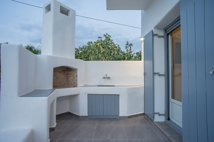 The barbecue place of the renovated house at Paros